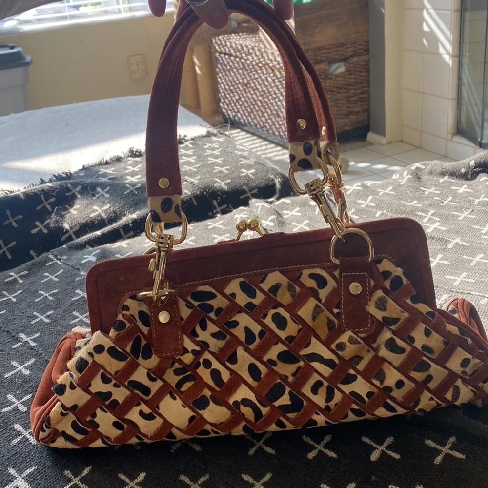 Gretchen Christine Rossi of OCH Lust 4 Luxe. An animal print leather handles - Picture 2 of 12